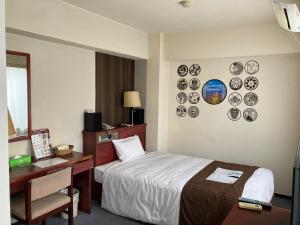 Postel nebo postele na pokoji v ubytování Sky Heart Hotel Koiwa
