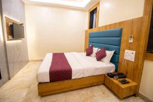 Postel nebo postele na pokoji v ubytování Hotel National - Grant Road