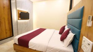 Postel nebo postele na pokoji v ubytování Hotel National - Grant Road