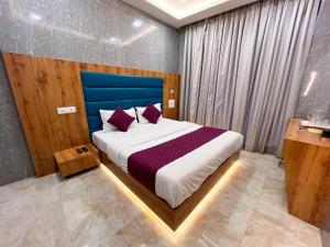 Postel nebo postele na pokoji v ubytování Hotel National - Grant Road