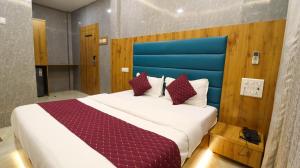 Postel nebo postele na pokoji v ubytování Hotel National - Grant Road