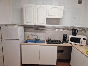 Η κουζίνα ή μικρή κουζίνα στο Une chambre