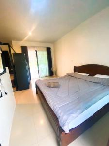 Postel nebo postele na pokoji v ubytování Share pool 1 room 2 bedroom
