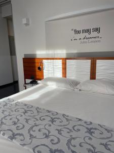 Postel nebo postele na pokoji v ubytování Hotel Europa Varese