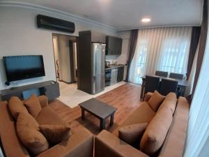 TV a/nebo společenská místnost v ubytování The U HOMES APART
