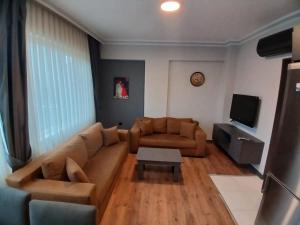 TV a/nebo společenská místnost v ubytování The U HOMES APART