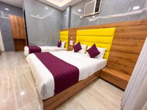 Postel nebo postele na pokoji v ubytování Hotel National - Grant Road