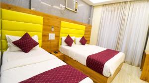Postel nebo postele na pokoji v ubytování Hotel National - Grant Road