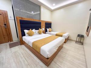 Postel nebo postele na pokoji v ubytování Hotel National - Grant Road