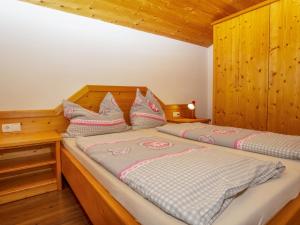 Ένα ή περισσότερα κρεβάτια σε δωμάτιο στο Holiday Home Auer-1 by Interhome