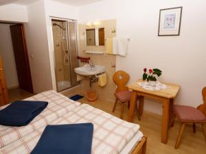 Posteľ alebo postele v izbe v ubytovaní Apartment Bischofsmütze by Interhome