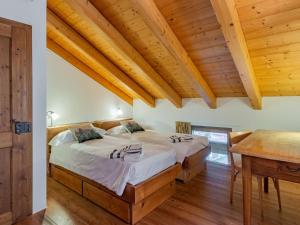 Katil atau katil-katil dalam bilik di Holiday Home La Meridiana by Interhome