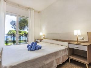 Postel nebo postele na pokoji v ubytování Apartment Palmeras by Interhome