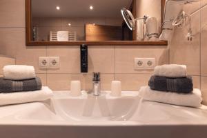 Kúpeľňa v ubytovaní Alpen-Appartements Zürcher + 36 fotografií