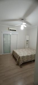 En eller flere senge i et værelse på Casa Centro Torres + 3 billeder