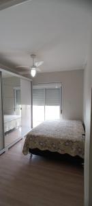 En eller flere senge i et værelse på Casa Centro Torres