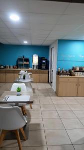 Kuchyň nebo kuchyňský kout v ubytování Appart Hotel Odalys City Amiens Blamont