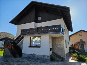 a house with a black roof at Apartment Josipina in Preddvor +13 photos