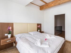 Posteľ alebo postele v izbe v ubytovaní Apartment Emma-4 by Interhome