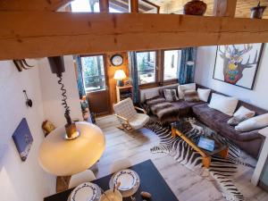 Area soggiorno di Apartment Les Arsets 308-15 by Interhome