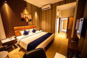 Voodi või voodid majutusasutuse Ananthyam Resort by Anukulas toas