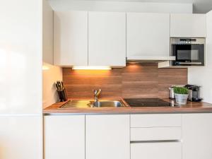 Kuchyňa alebo kuchynka v ubytovaní Apartment Emma-9 by Interhome