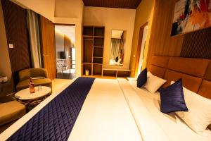 Voodi või voodid majutusasutuse Ananthyam Resort by Anukulas toas
