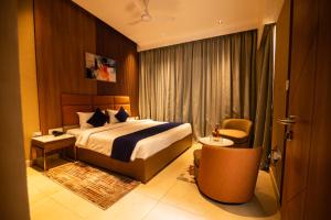 Voodi või voodid majutusasutuse Ananthyam Resort by Anukulas toas