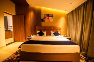 Voodi või voodid majutusasutuse Ananthyam Resort by Anukulas toas
