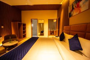 Voodi või voodid majutusasutuse Ananthyam Resort by Anukulas toas