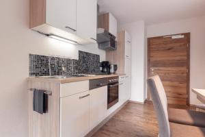 Kuchyňa alebo kuchynka v ubytovaní Alpen-Appartements Zürcher