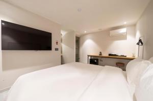 Η κουζίνα ή μικρή κουζίνα στο Echae Hotel
