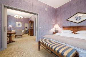 Postel nebo postele na pokoji v ubytování Grand Hotel Viljandi + 37 fotografií