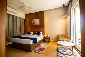 Voodi või voodid majutusasutuse Ananthyam Resort by Anukulas toas