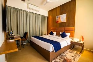 Voodi või voodid majutusasutuse Ananthyam Resort by Anukulas toas