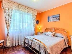 Postel nebo postele na pokoji v ubytování Apartment Francesca by Interhome