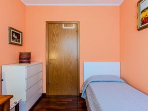 Postel nebo postele na pokoji v ubytování Apartment Francesca by Interhome