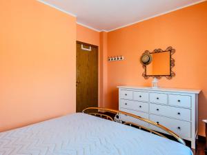 Postel nebo postele na pokoji v ubytování Apartment Francesca by Interhome