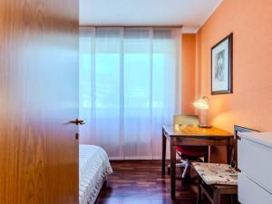 Postel nebo postele na pokoji v ubytování Apartment Francesca by Interhome