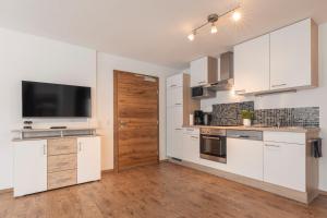 Kuchyňa alebo kuchynka v ubytovaní Alpen-Appartements Zürcher
