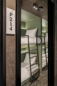 Letto o letti in una camera di Pods by The Usual Rotterdam