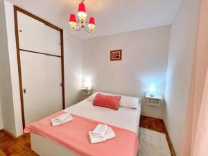 Łóżko lub łóżka w pokoju w obiekcie Apartments Brebric