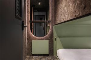 Letto o letti in una camera di Pods by The Usual Rotterdam
