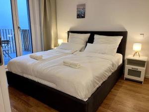 Katil atau katil-katil dalam bilik di Modern Studio near Airport