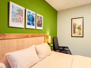 Postel nebo postele na pokoji v ubytování Locus Coliving