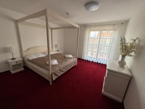Postel nebo postele na pokoji v ubytování Hotel Sebastian u Hoffera