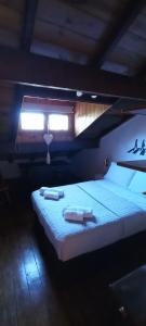 Ένα ή περισσότερα κρεβάτια σε δωμάτιο στο Departamento en chalet tradicional +4 φωτογραφίες