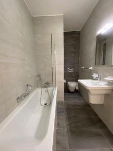 Koupelna v ubytování StJulians Apartment Juel + 9 fotografií