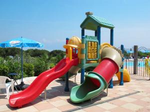 a playground with a slide and a slideintend at Holiday Home Eden-3 by Interhome in San Felice del Benaco