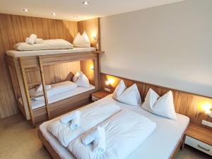 Ένα ή περισσότερα κρεβάτια σε δωμάτιο στο Apartment Bella Monte-5 by Interhome